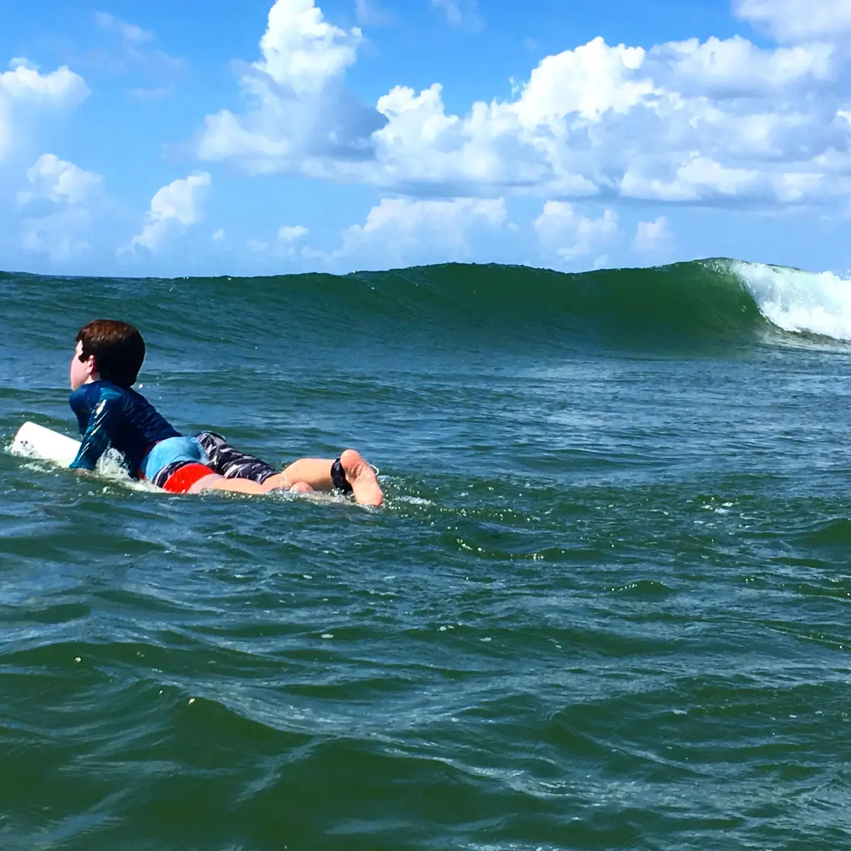 Boy surfing